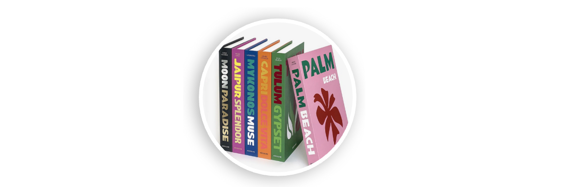 Stack of colorful decorative books with travel and lifestyle titles, including Palm Beach, Mykonos Muse, and Capri Dolce Vita, arranged on a white background